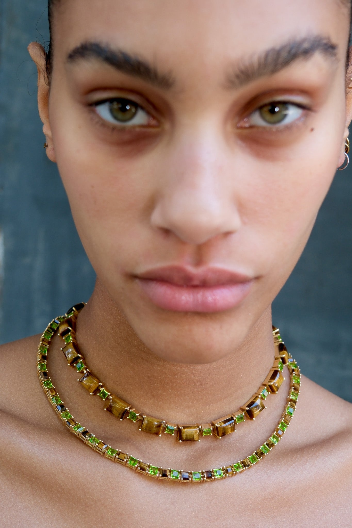 Tiger Eye and Poison Dart Tennis Necklace in gold — step-cut genuine tiger eye and bright green glass in a continuous line setting — view 3