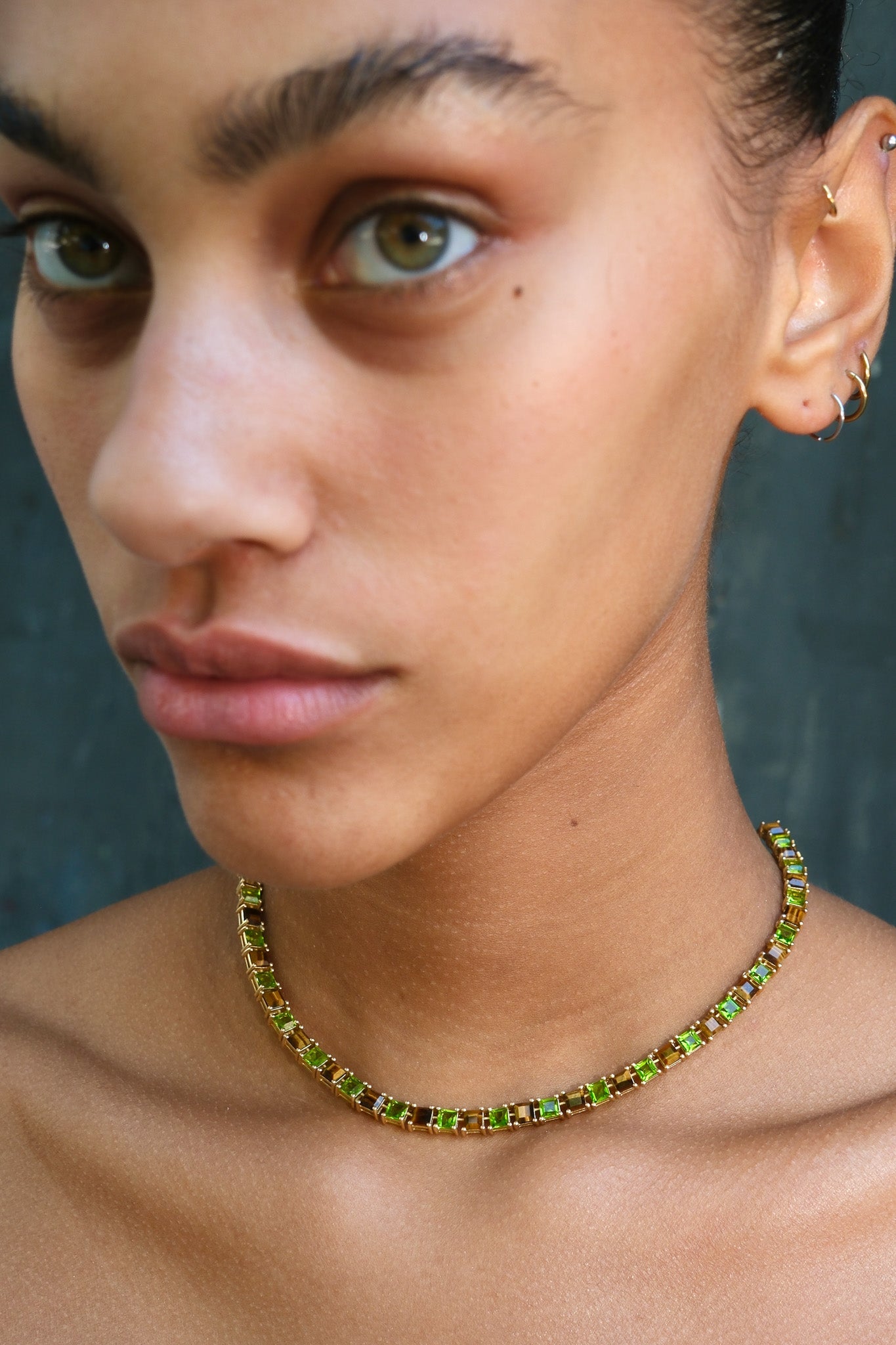 Tiger Eye and Poison Dart Tennis Necklace in gold — step-cut genuine tiger eye and bright green glass in a continuous line setting — view 2
