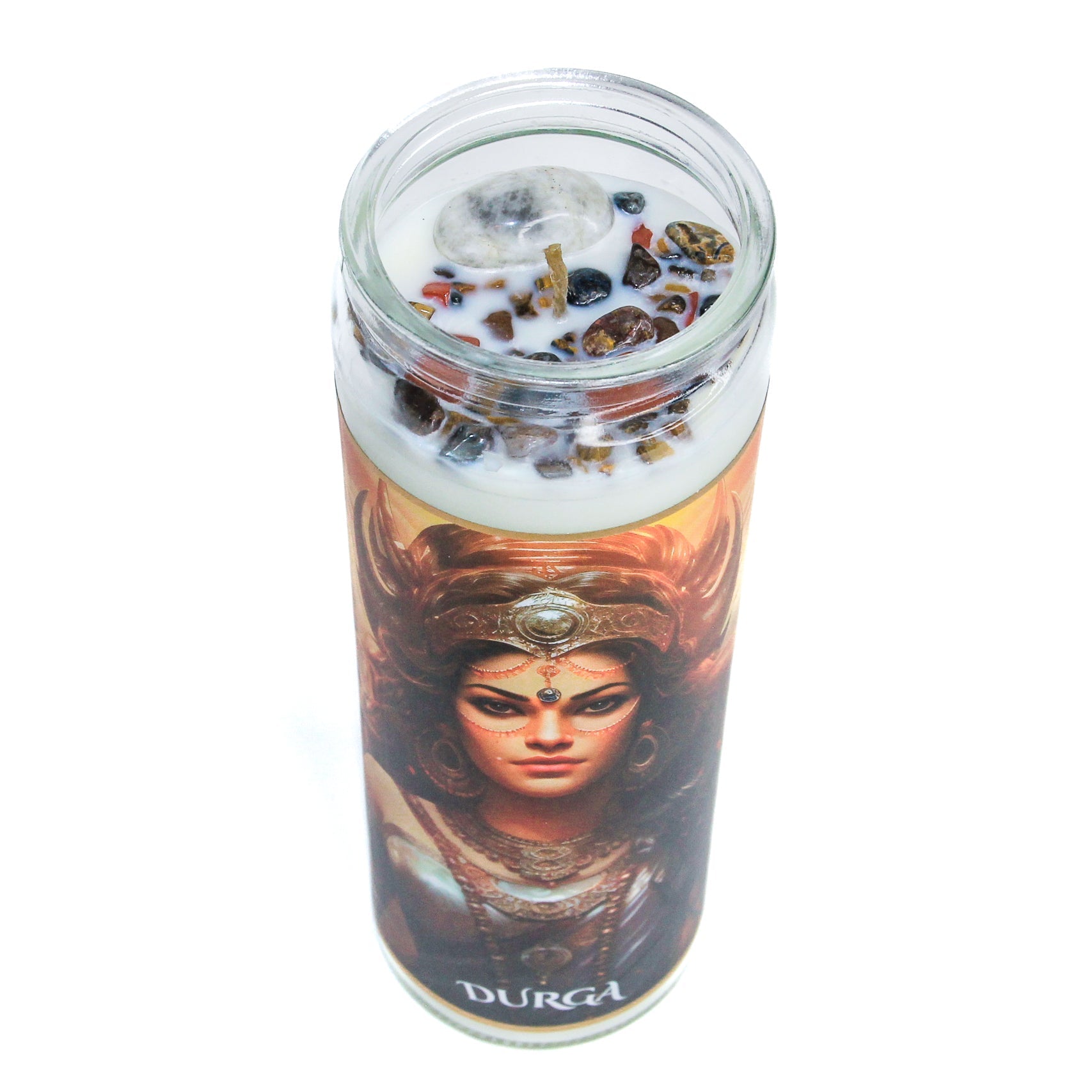 The Durga altar candle lit, showing the flame and melt pool