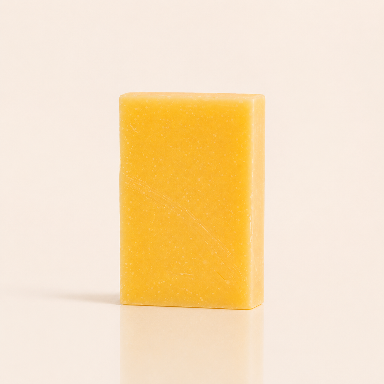 Olive oil and lemongrass anti-aging bar soap, pale bar with a smooth finish