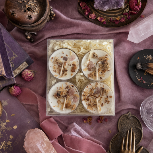 The Freyja devotional tealight set with several small dressed tealight candles for the altar.