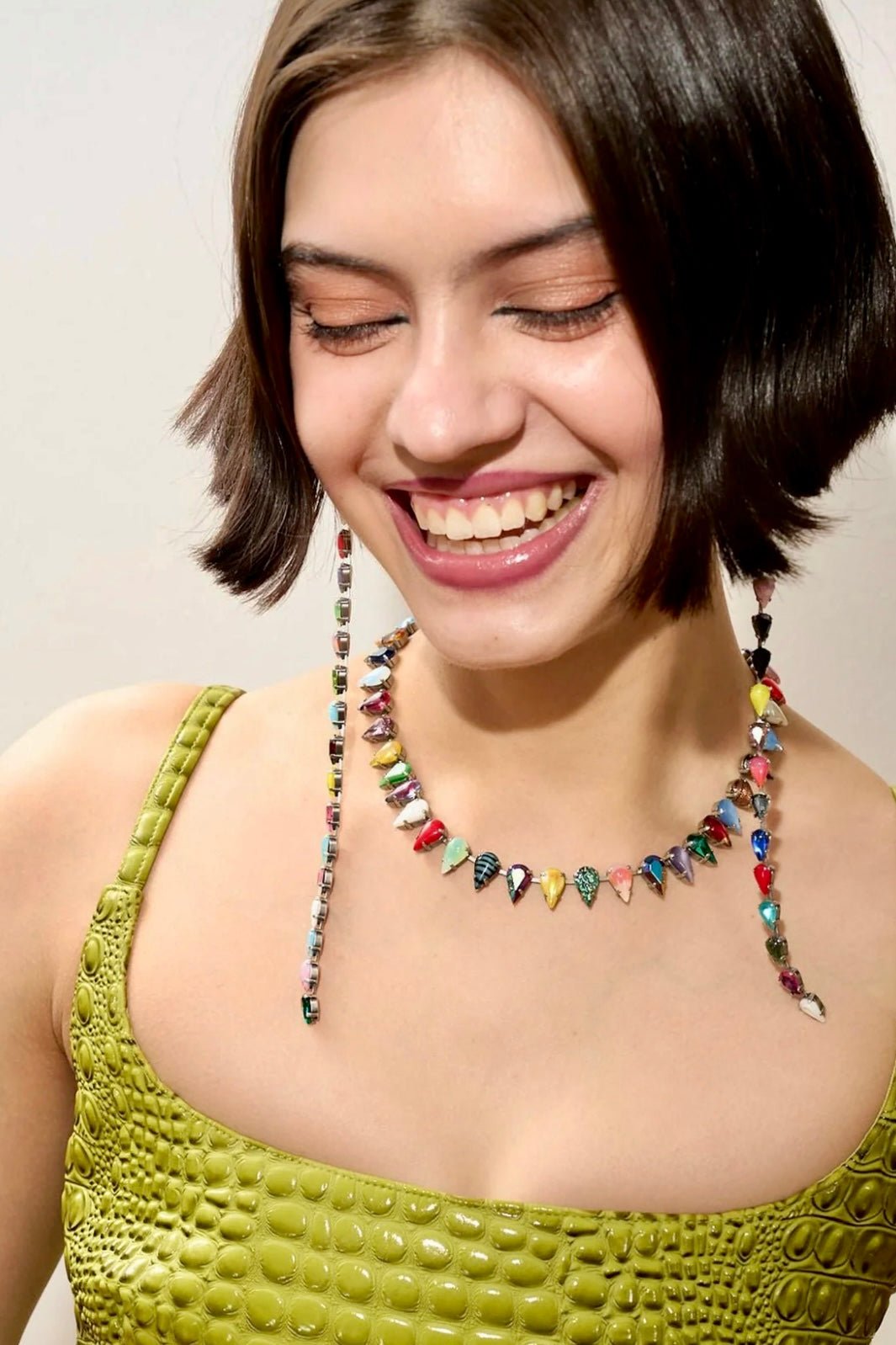 Detail of multicolor fang-shaped glass stones