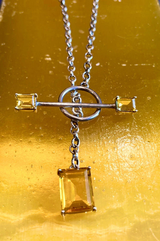 Gem Drop Toggle Necklace in Golden — long oxidized silver chain with front toggle closure and a faceted golden yellow glass drop