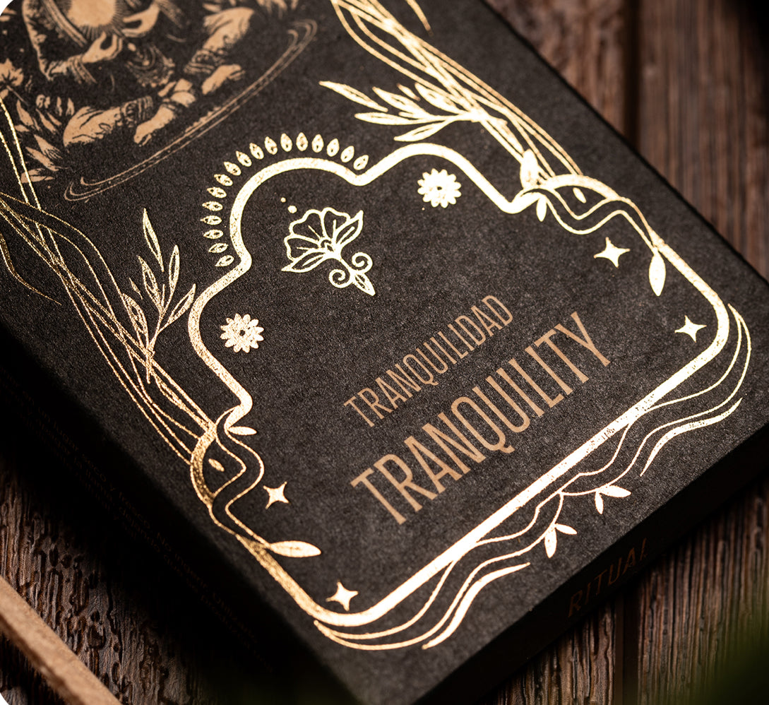 Tranquilidad Tranquility lettering printed in gold on the black box