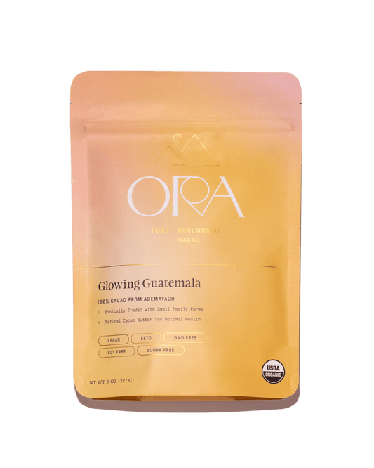 Front of the Ora Glowing Guatemala ceremonial cacao pouch with cacao discs