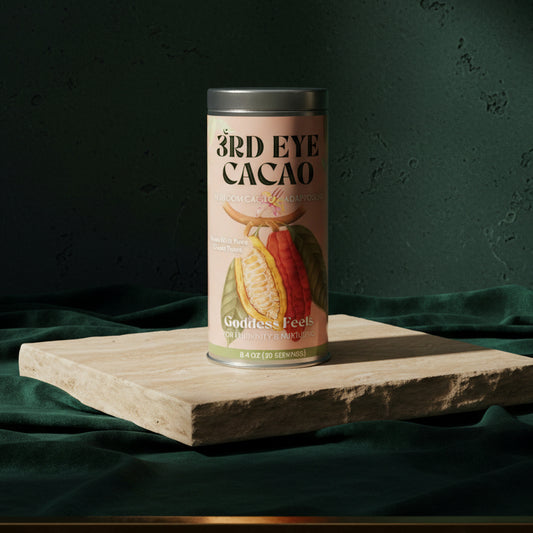 3rd Eye Cacao Goddess Feels tin, 8.4 oz, on a wooden board against a dark green backdrop
