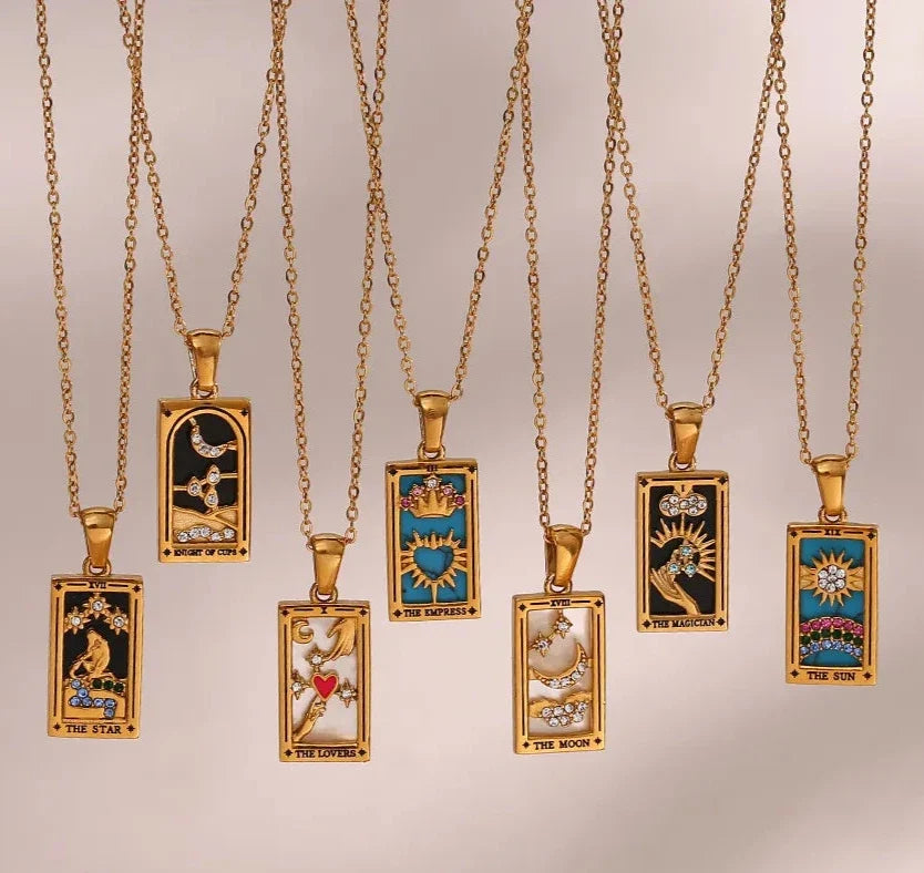 Gold-tone stainless steel tarot card pendant necklace with enamel and zircon detail on a fine chain