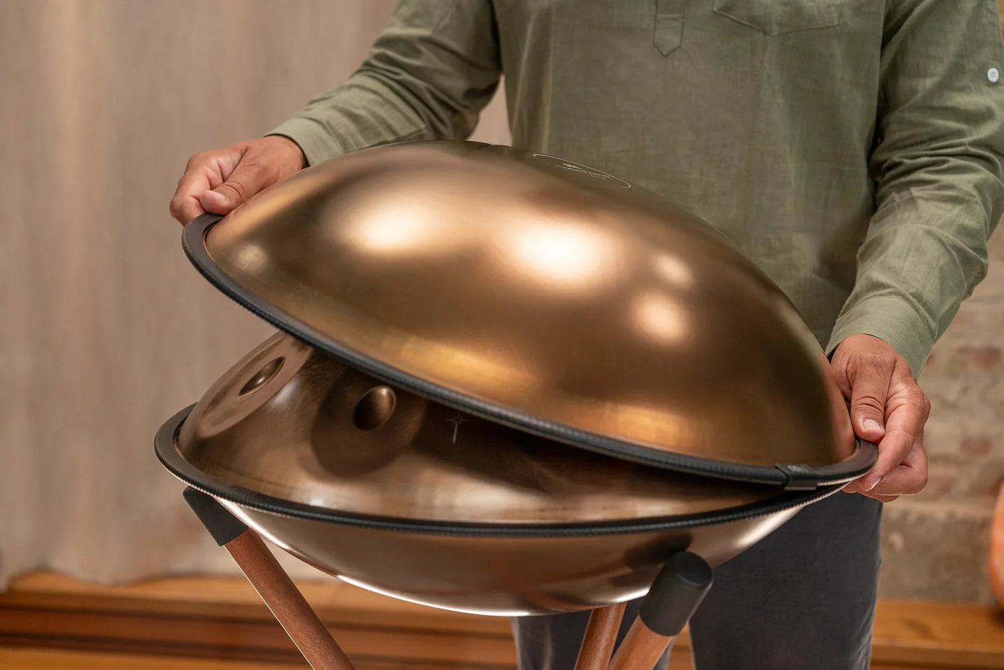 Close detail view of the vintage copper Sensory handpan with engraved design.