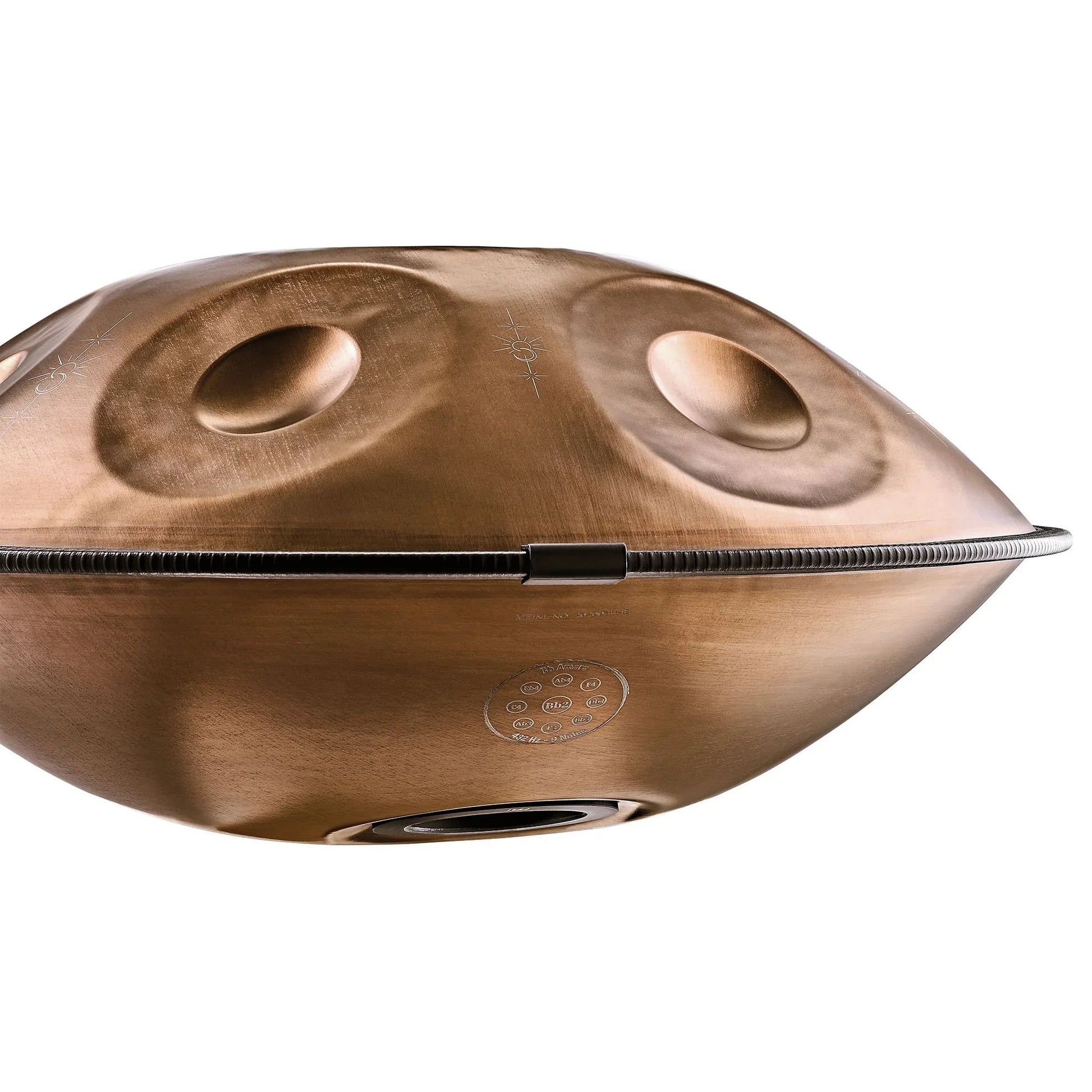 Vintage copper Sensory handpan with engraved design displayed in a calm, styled interior setting.