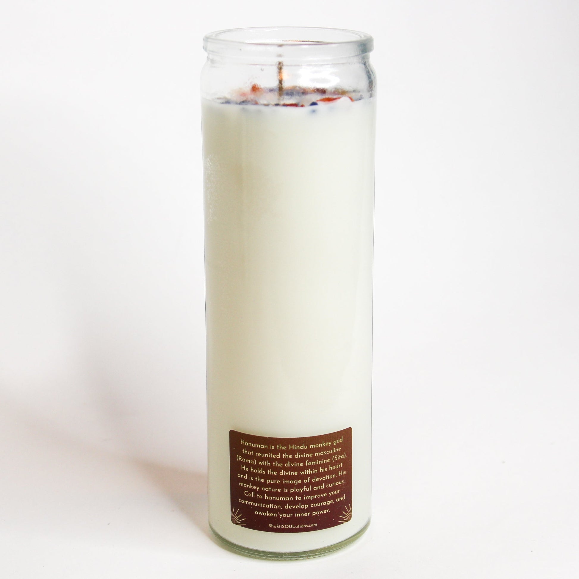 Back of the Hanuman altar candle showing the printed image and inscription