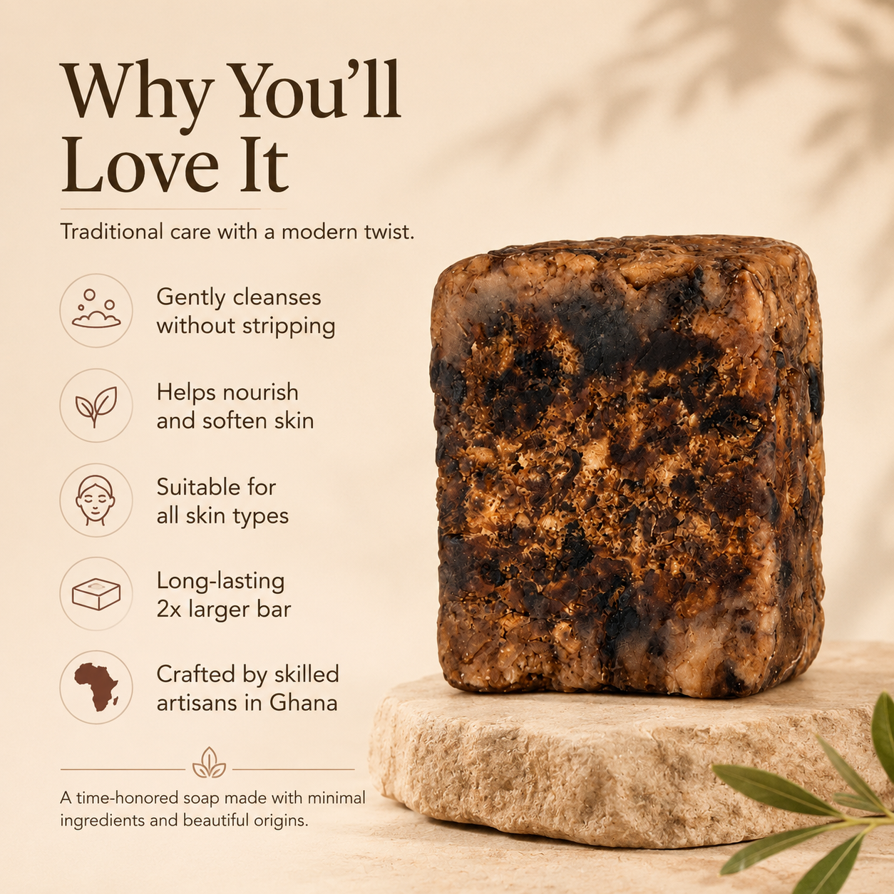 RAW African black soap bar held to show its 8 oz size