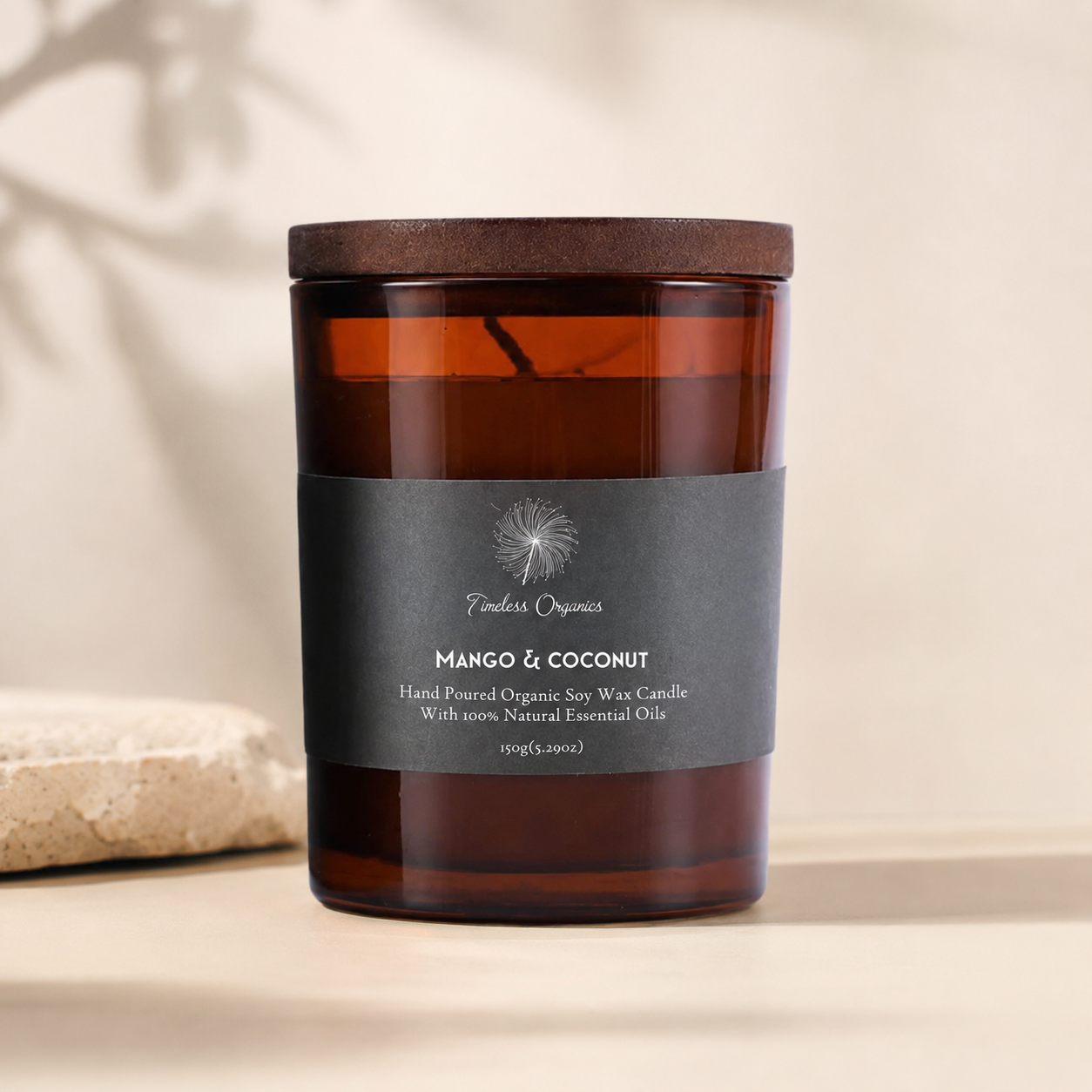 Mango and coconut hand-poured organic soy candle in recyclable amber glass