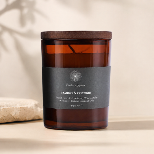 Mango and coconut hand-poured organic soy candle in recyclable amber glass