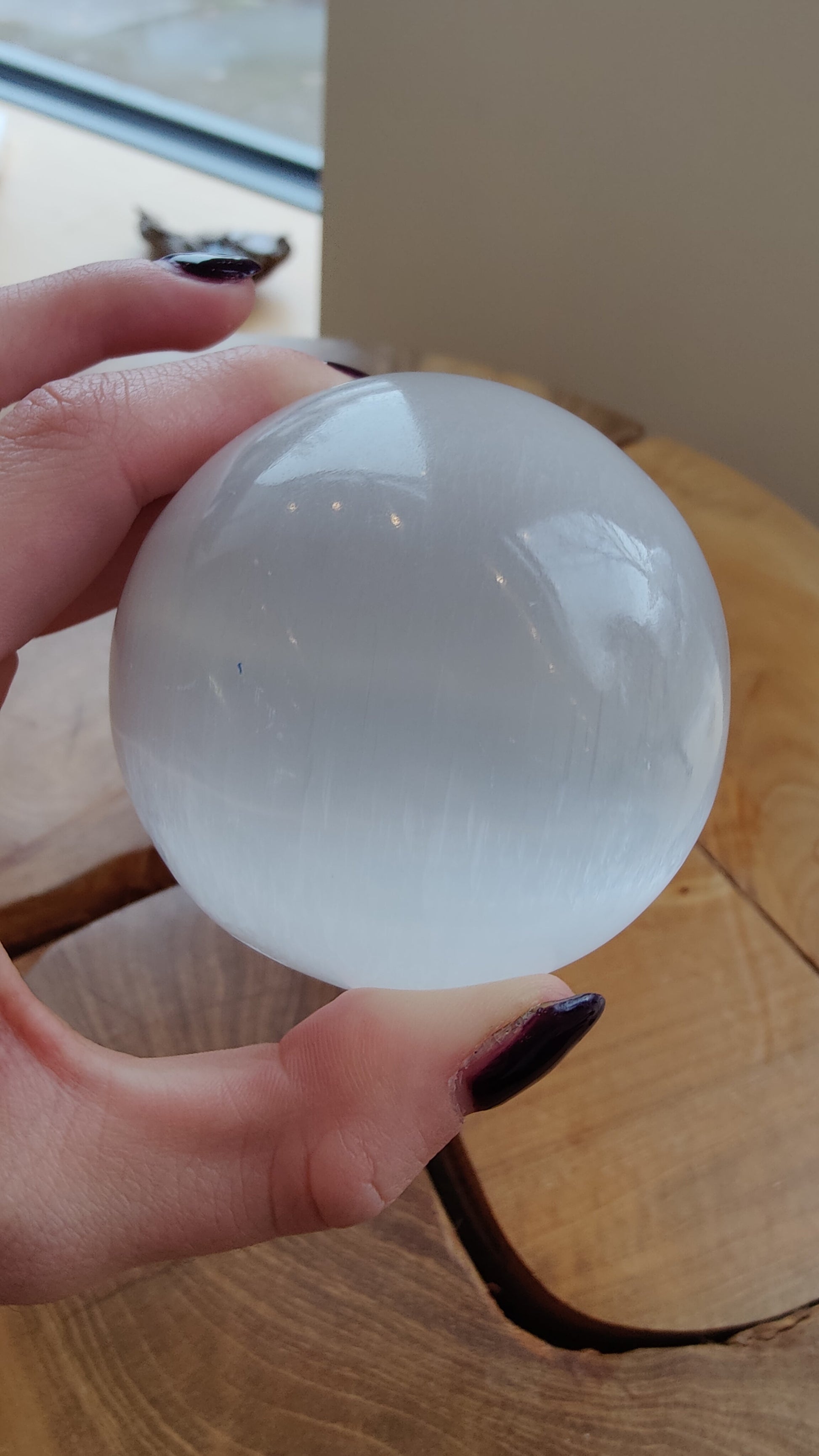 Large selenite sphere photographed from above