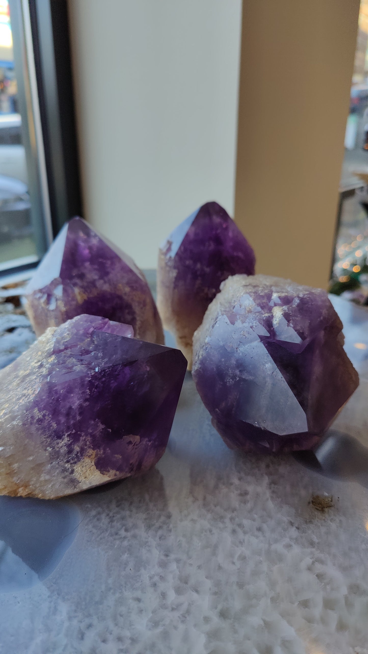 Amethyst point showing deep purple colour zoning toward the tip