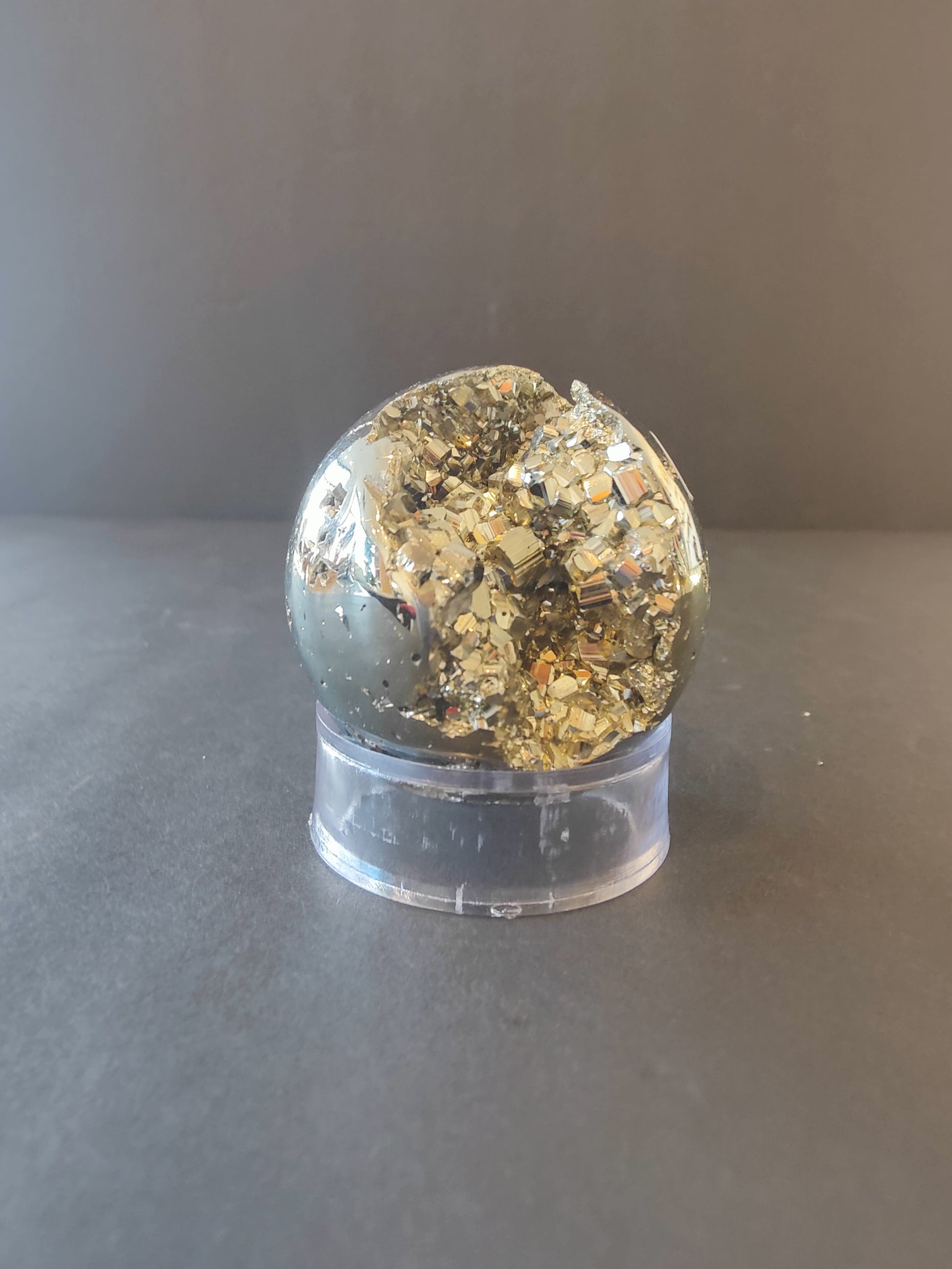 Polished pyrite spheres, eggs and hearts from Peru with a metallic gold surface, 40 to 65 millimetres — view 2