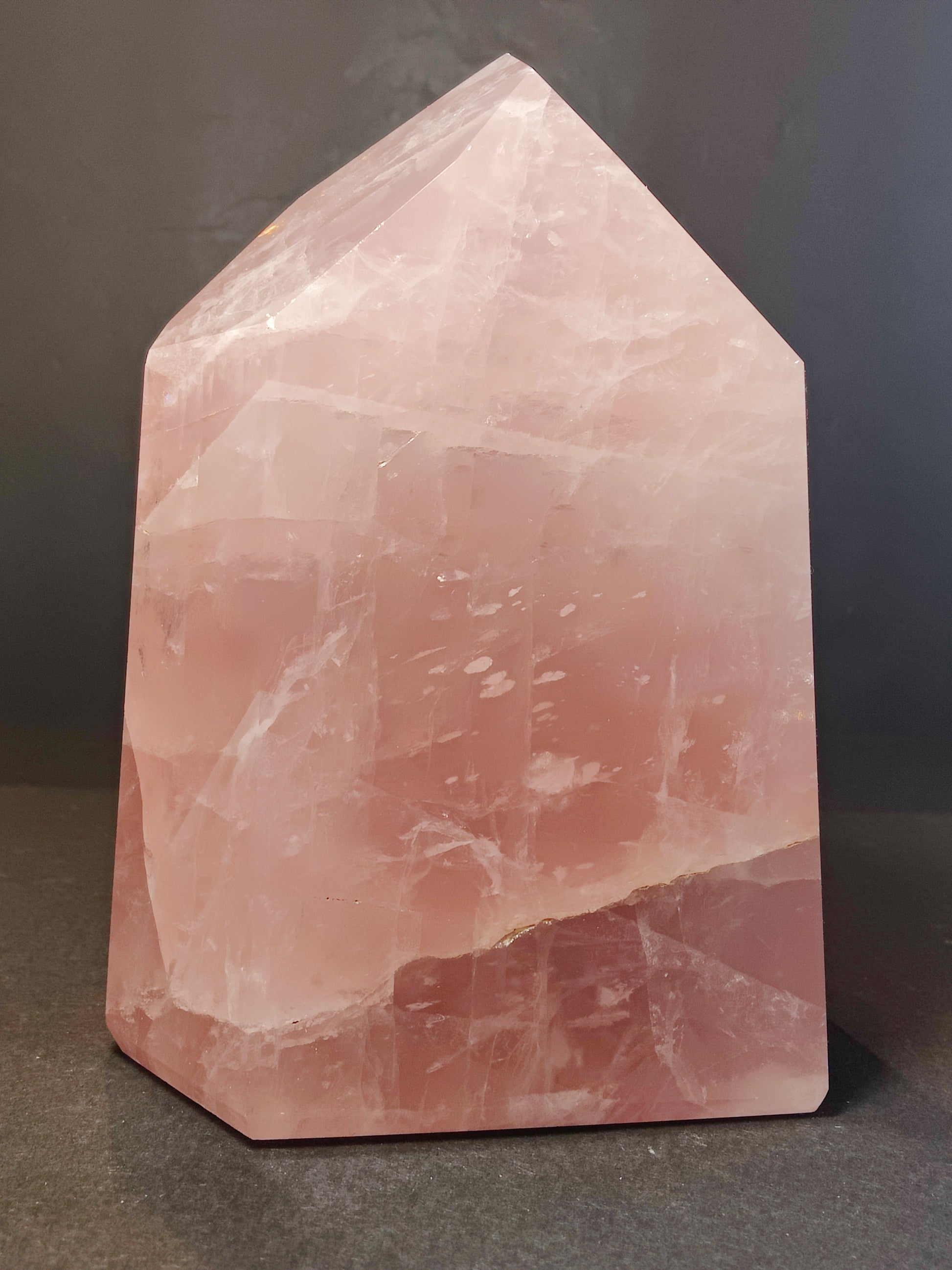 Polished rose quartz obelisk tower in soft translucent pink, standing upright — view 5