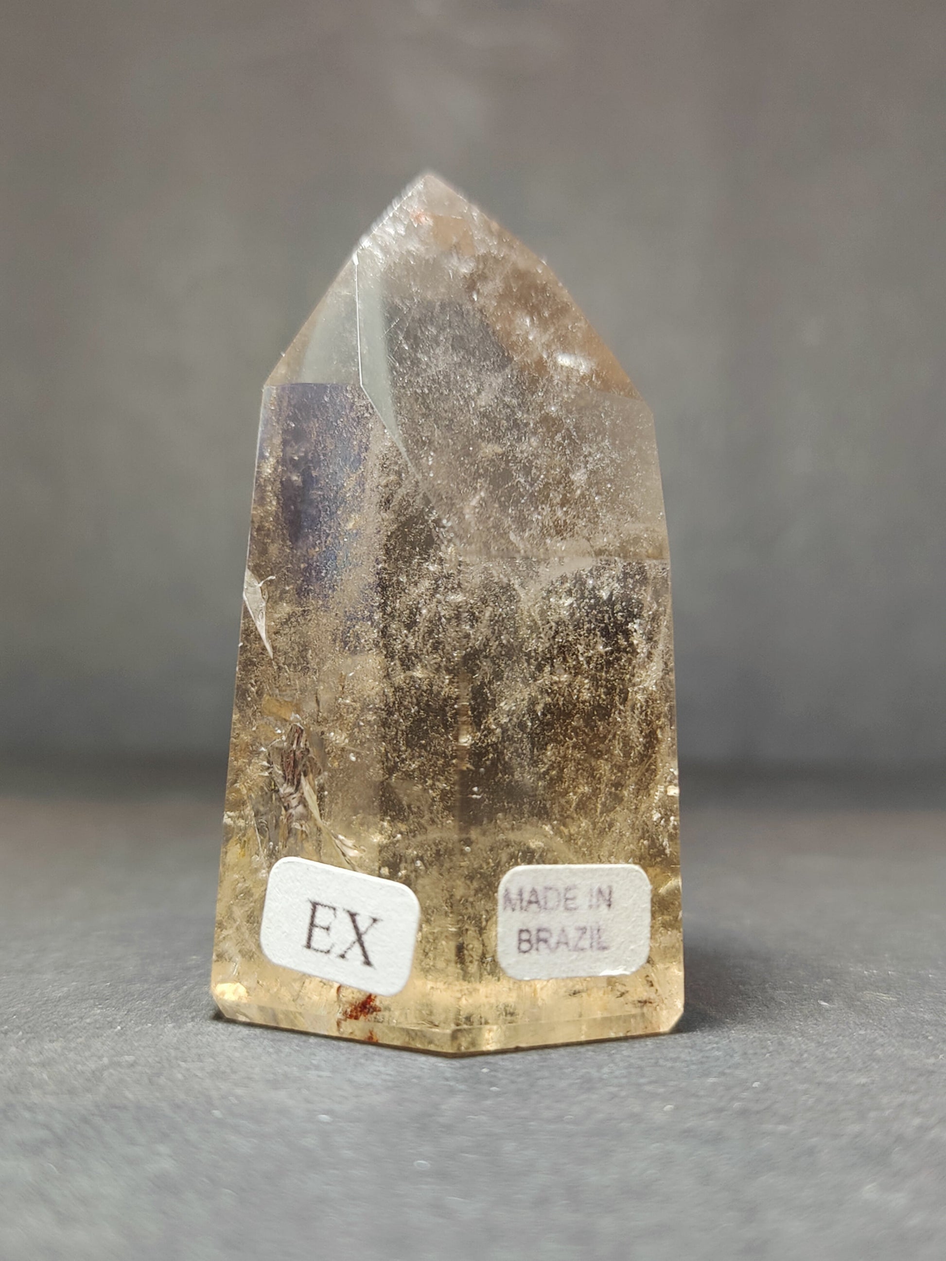 Detail of the polished surface of the Smoky & Clear Quartz Free Form Sculpture