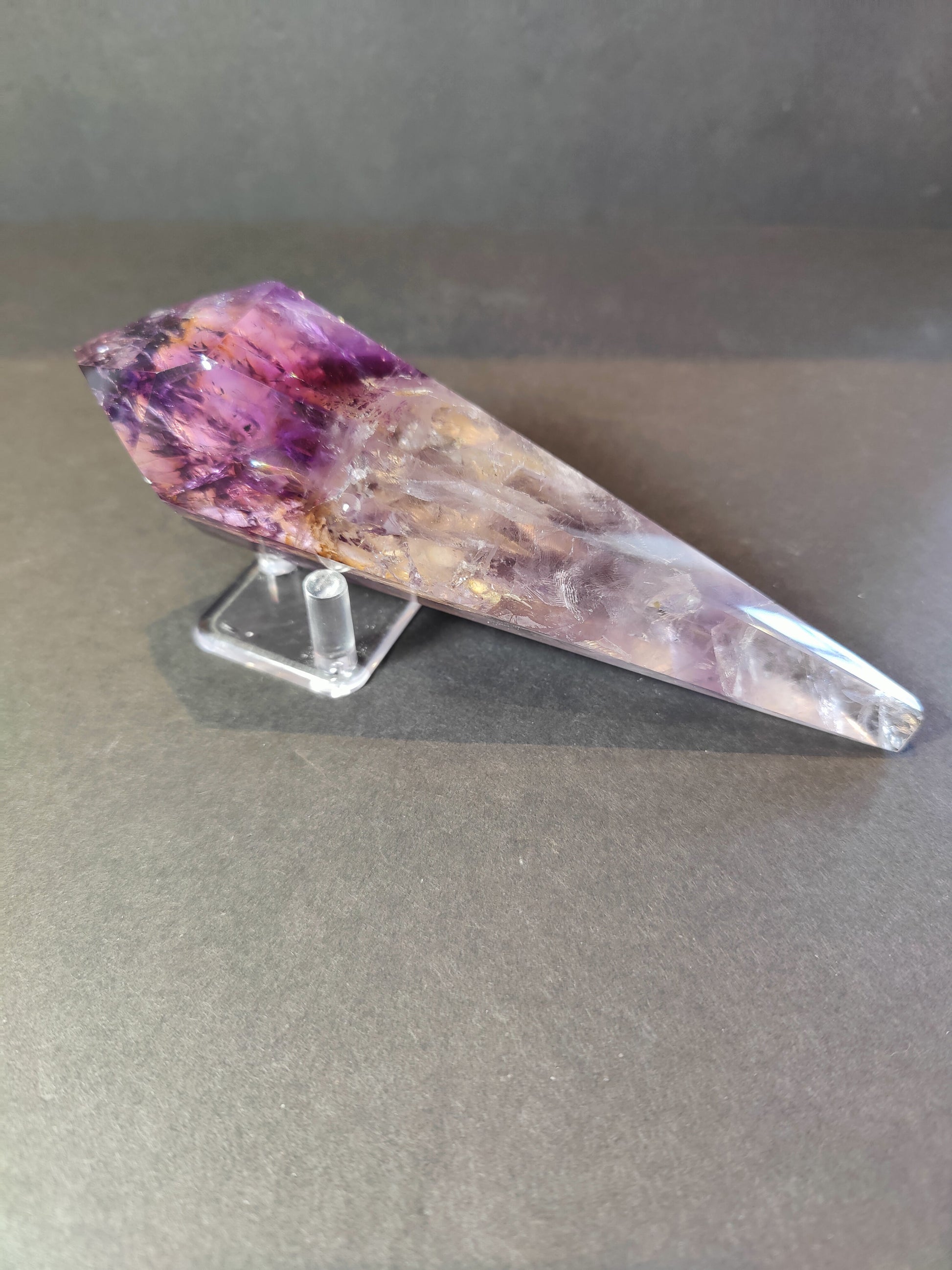 Amethyst wand and metal stand shown separately