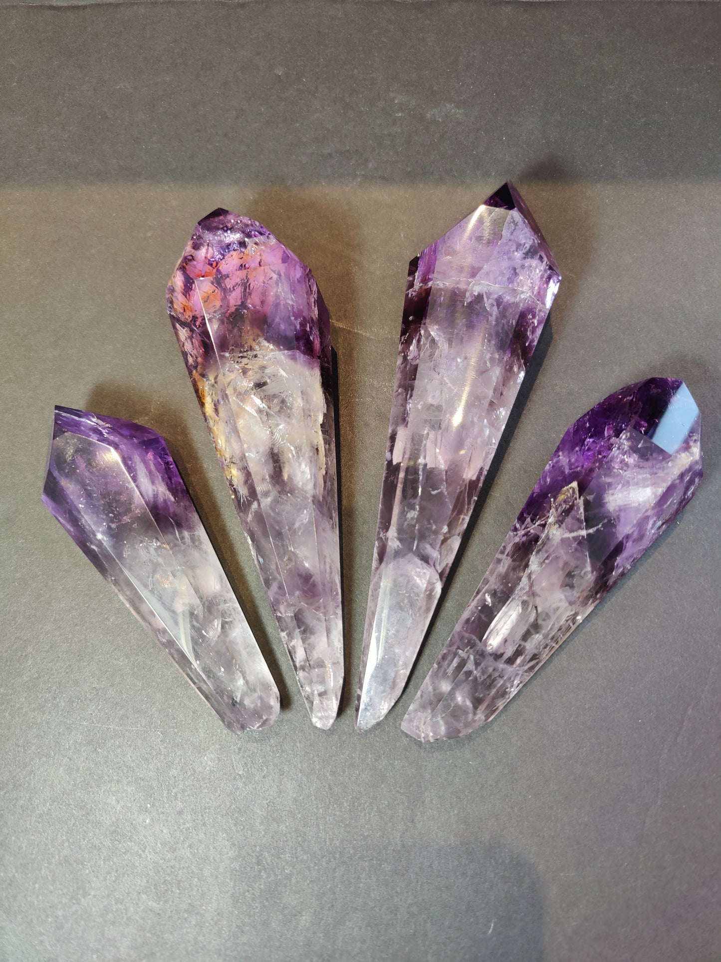 Amethyst scepter wand seen from the side showing colour banding