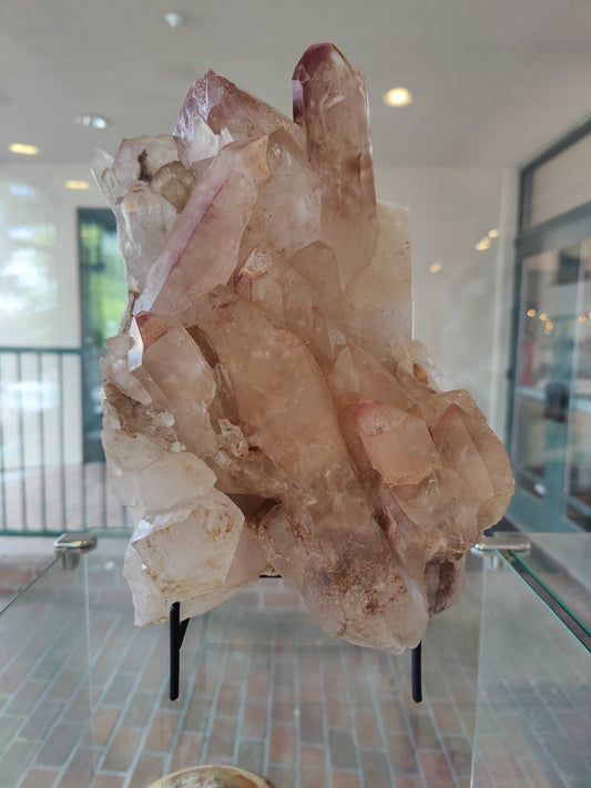 Large lithium quartz cluster with lilac grey coated points on natural quartz matrix