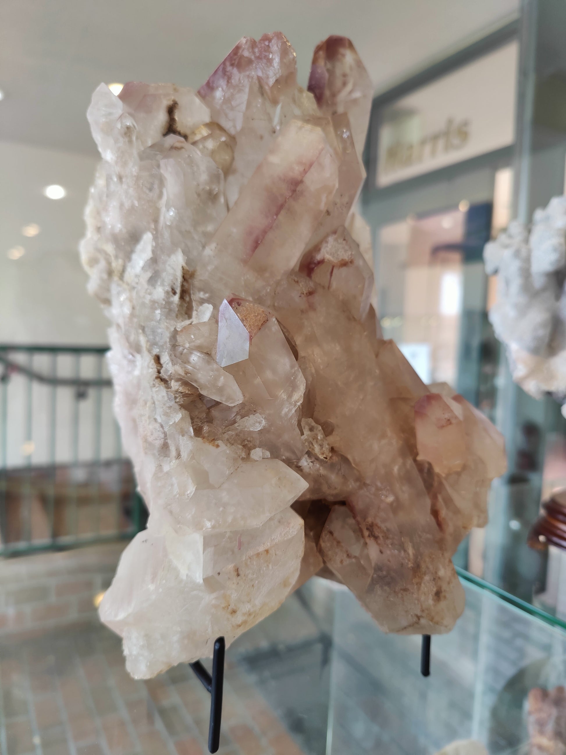 Large lithium quartz cluster with lilac grey coated points on natural quartz matrix — view 2