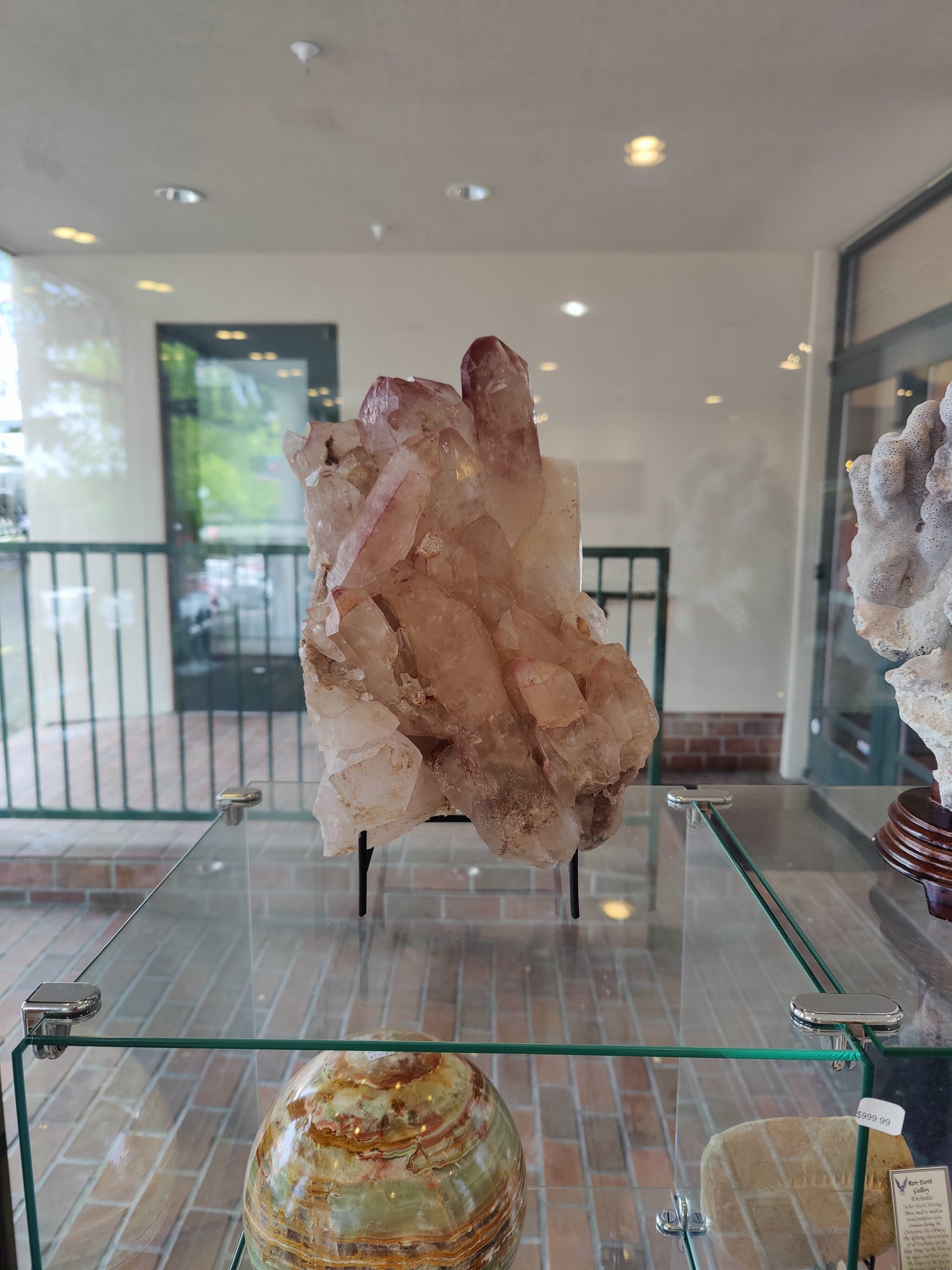 Large lithium quartz cluster with lilac grey coated points on natural quartz matrix — view 4