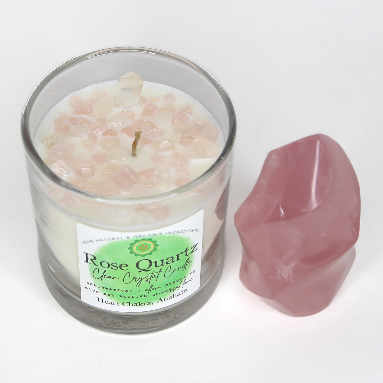 The Rose Quartz chakra candle with its label and crystal detail