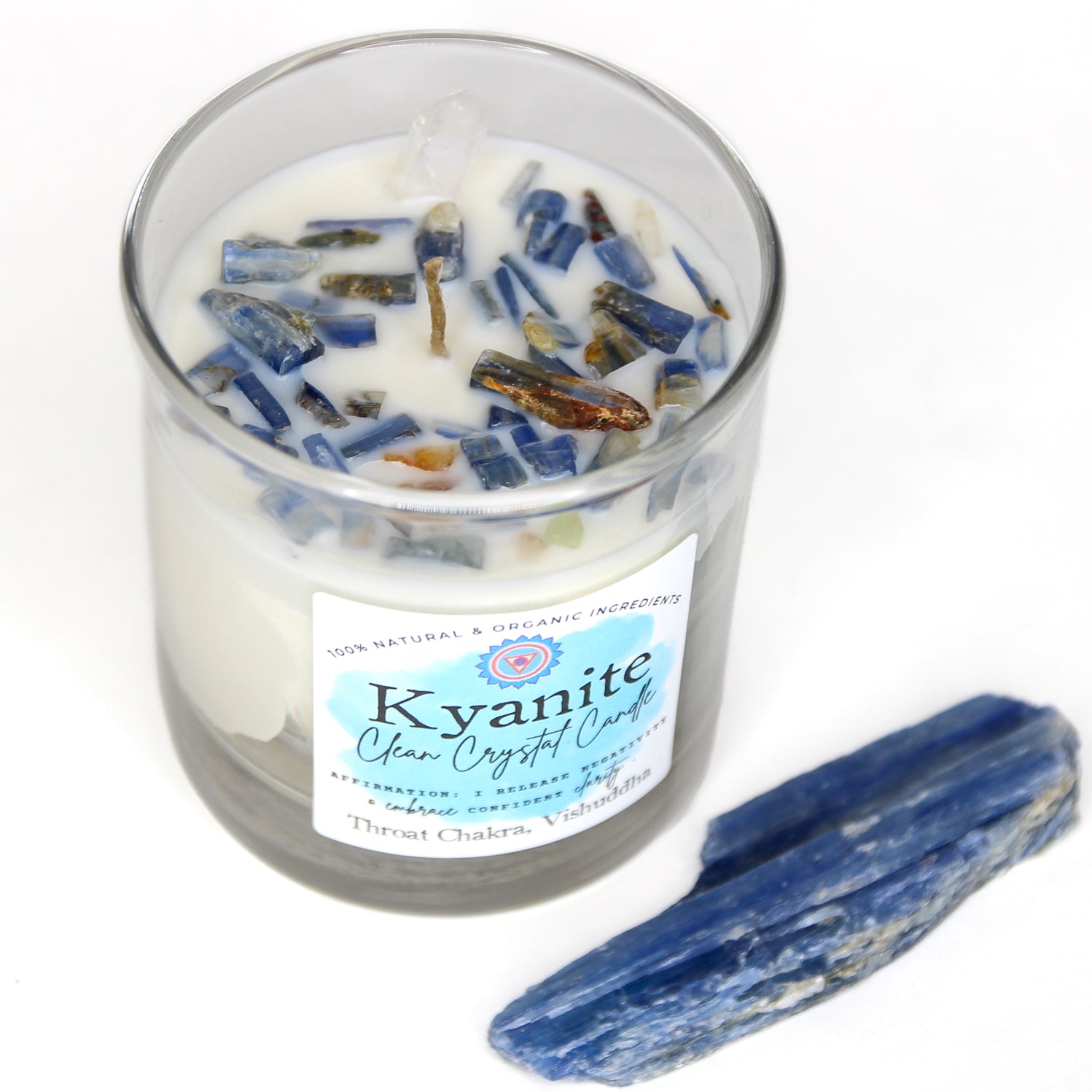 The Blue Kyanite chakra candle with its label and crystal detail