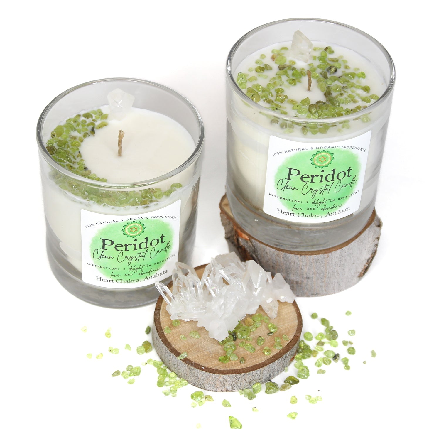 Peridot Clean Crystal Candle in a clear lead-free glass tumbler, topped with green peridot chips and a clear quartz point — product photo 2