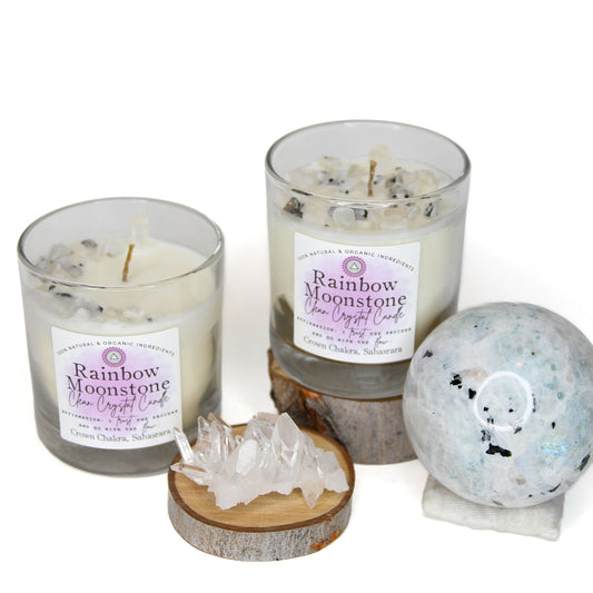 Rainbow Moonstone Clean Crystal Candle in a clear lead-free glass tumbler, topped with rainbow moonstone chips and a clear quartz point