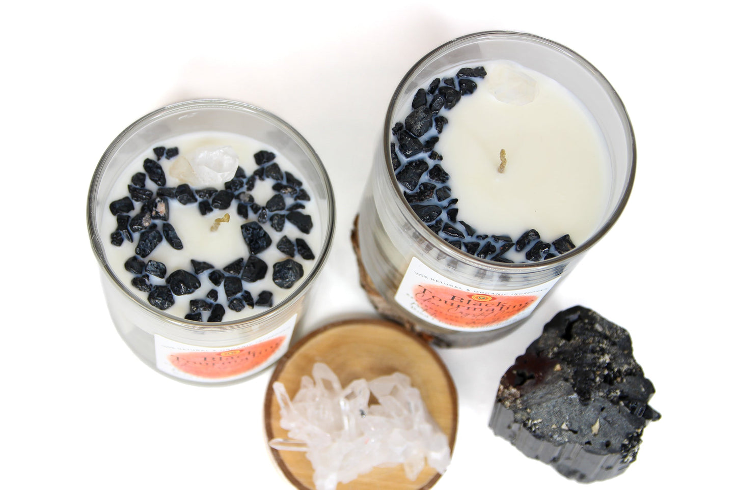 Close-up of the Black Tourmaline crystals and clear quartz point on the candle