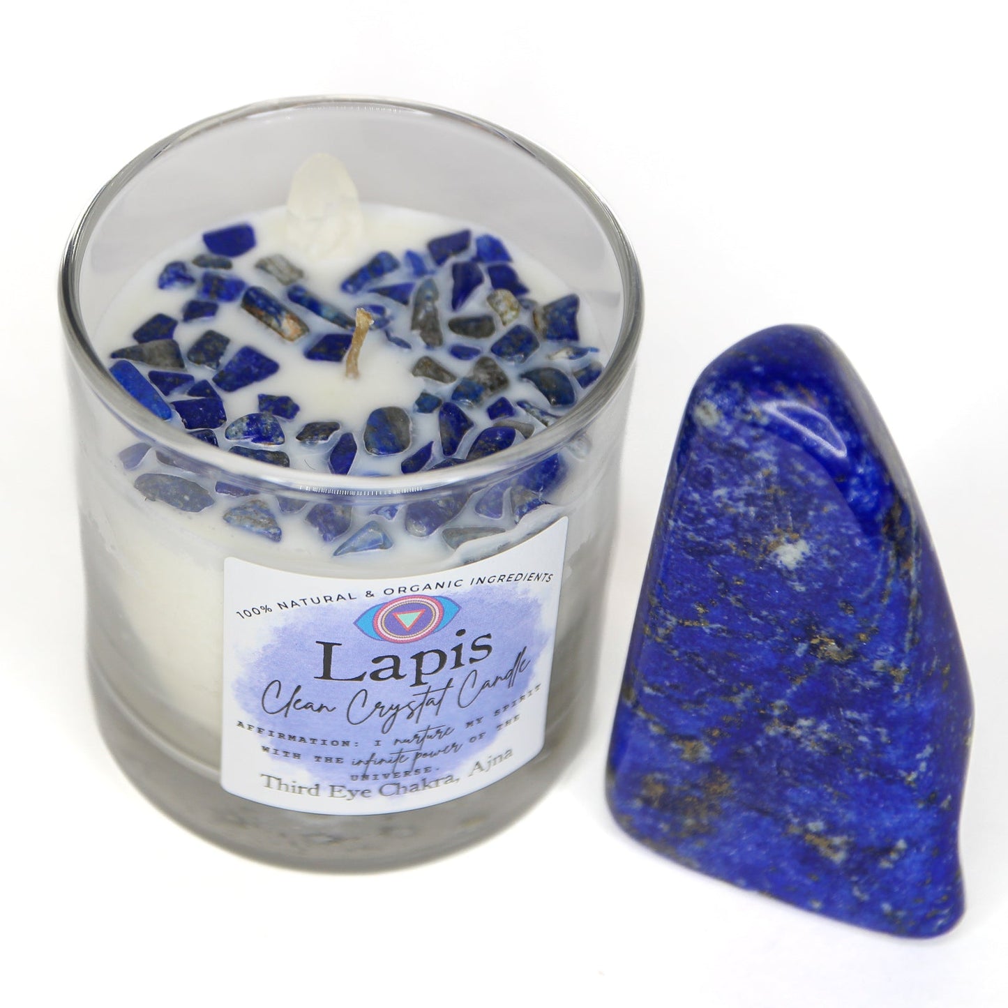 The Lapis Lazuli chakra candle with its label and crystal detail