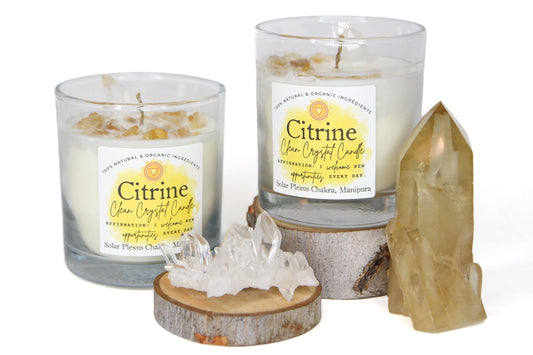 Citrine Clean Crystal Candle in a clear lead-free glass tumbler, topped with golden citrine chips and a clear quartz point