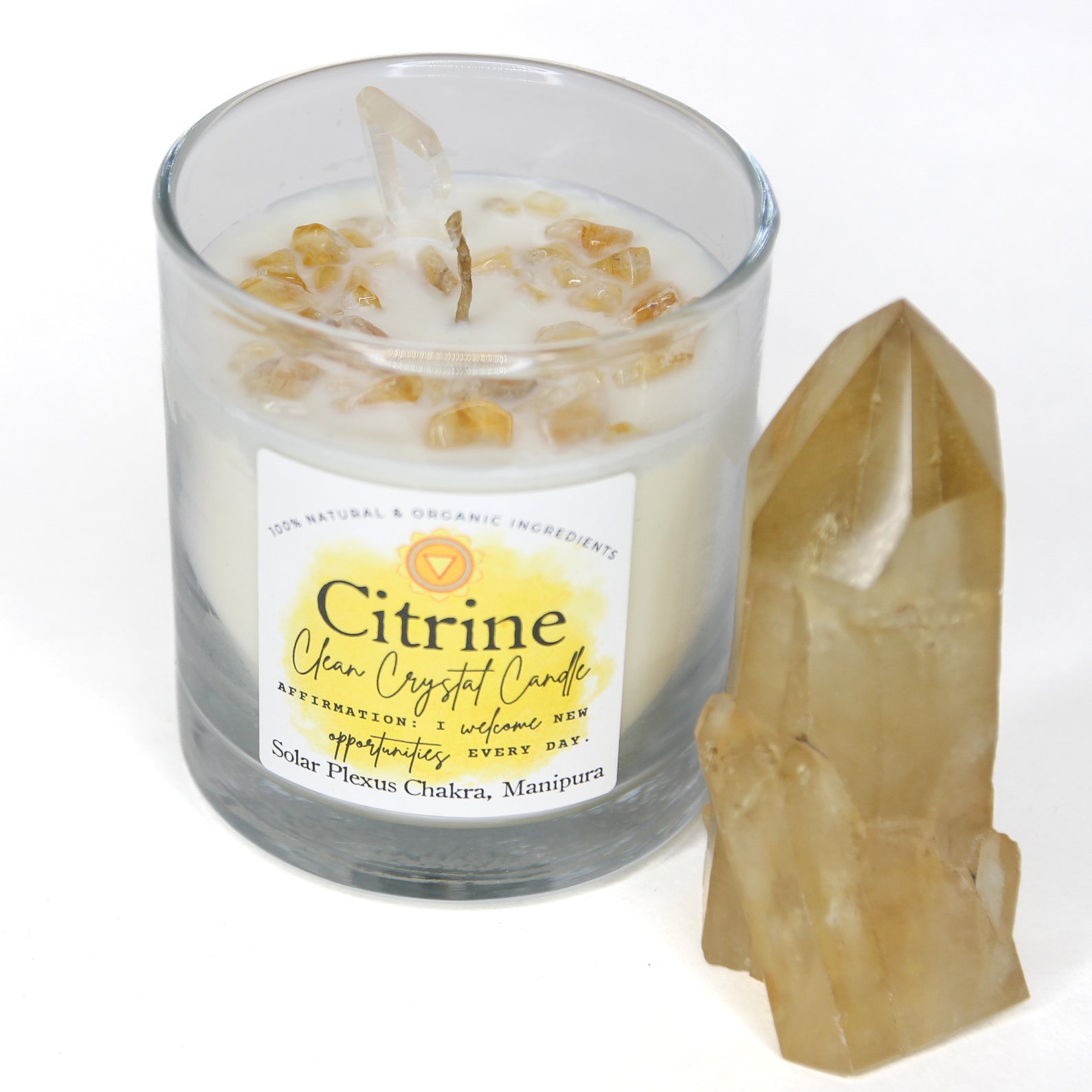 Citrine Clean Crystal Candle in a clear lead-free glass tumbler, topped with golden citrine chips and a clear quartz point — product photo 5