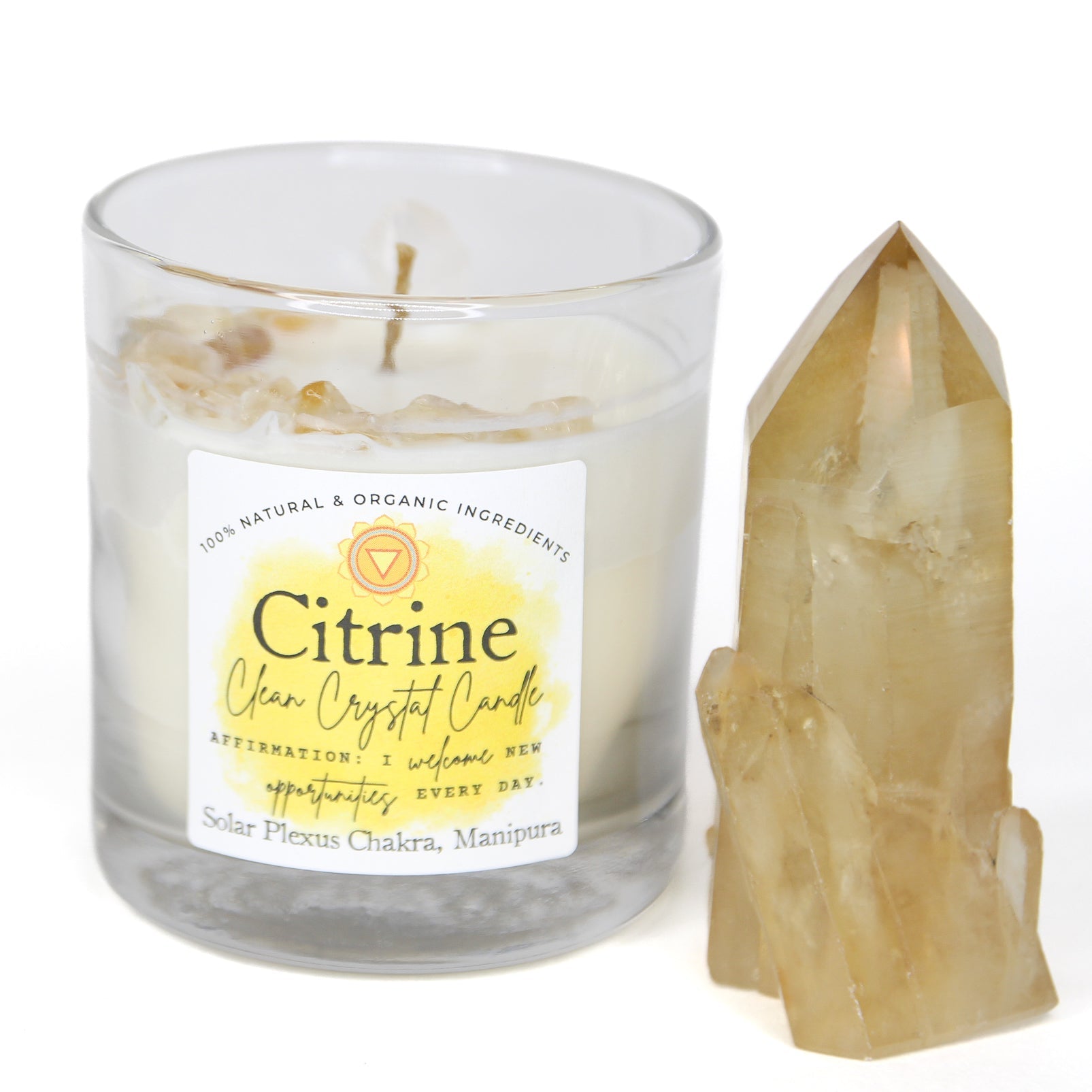 Citrine Clean Crystal Candle in a clear lead-free glass tumbler, topped with golden citrine chips and a clear quartz point — product photo 6