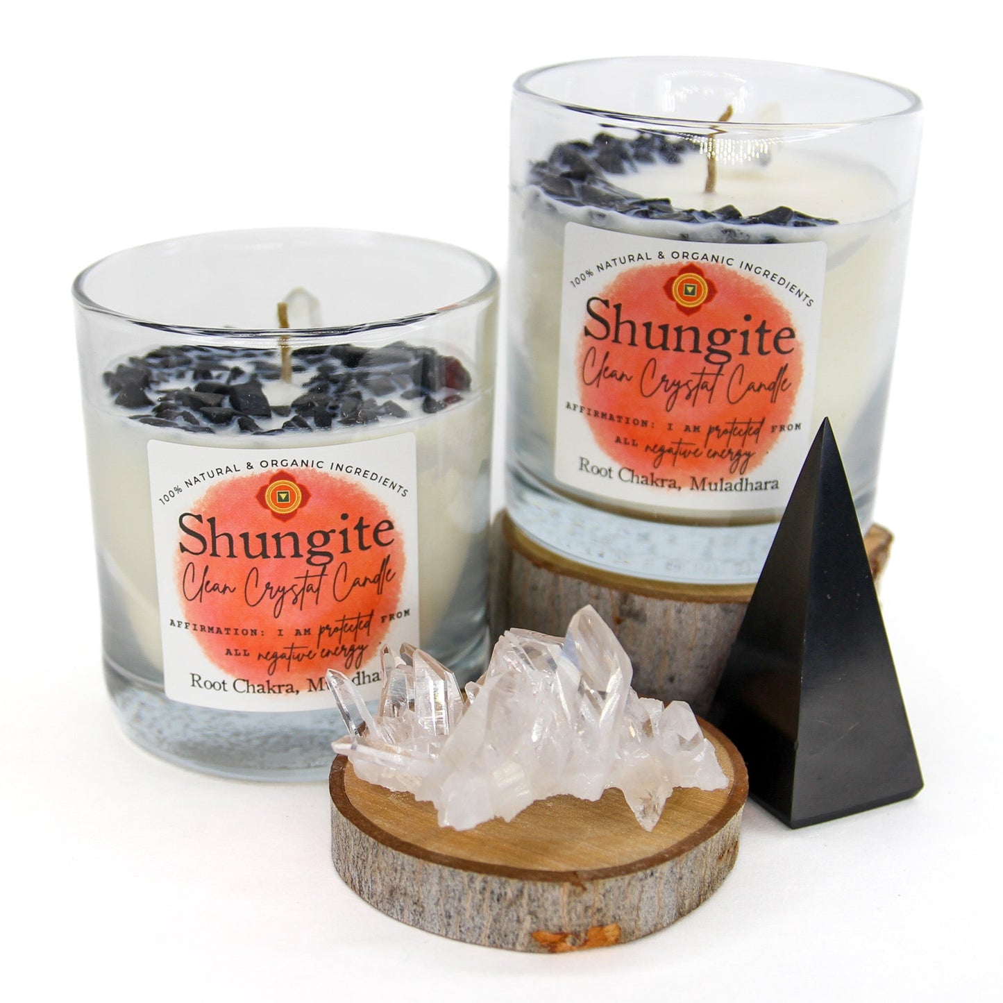 Close-up of the Shungite crystals and clear quartz point on the candle