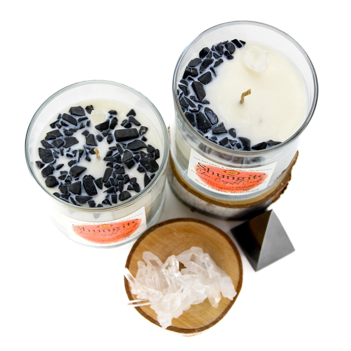 The Shungite chakra candle with its label and crystal detail