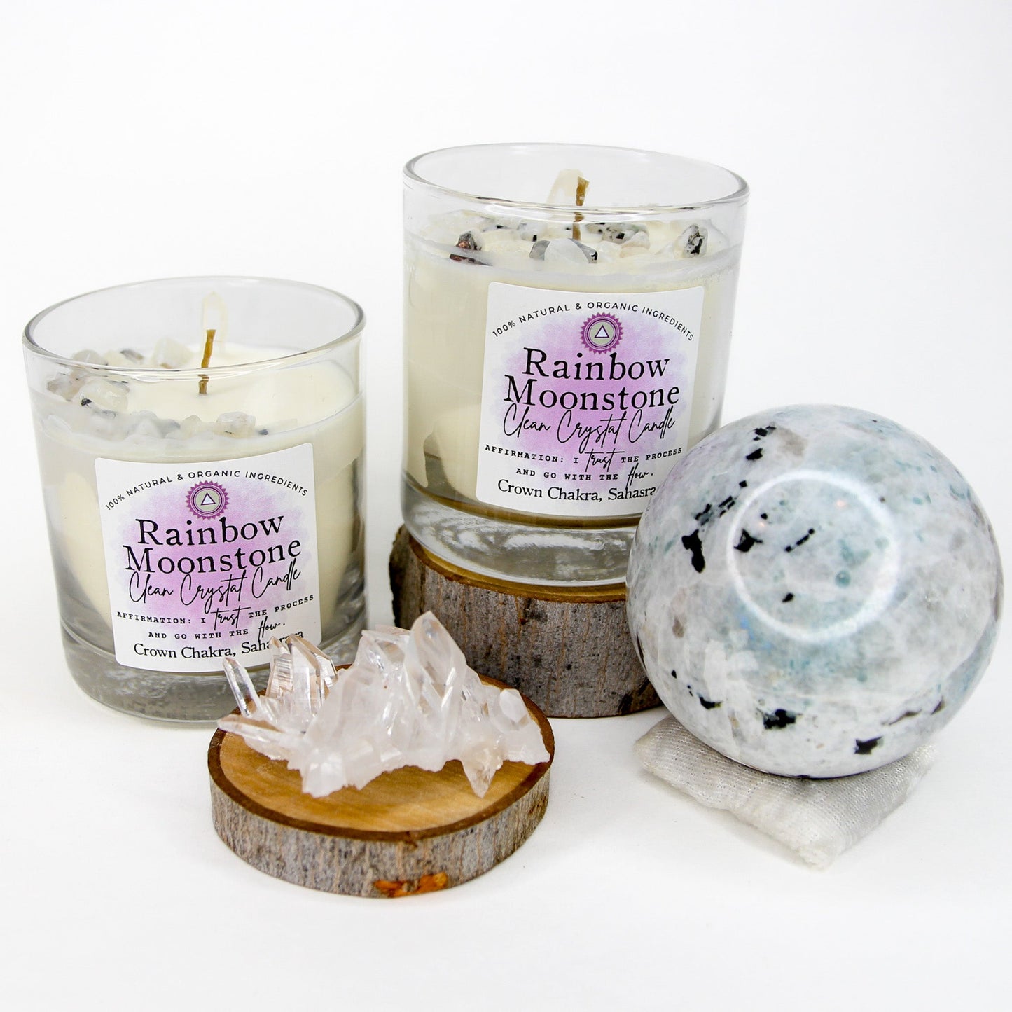 Rainbow Moonstone Clean Crystal Candle in a clear lead-free glass tumbler, topped with rainbow moonstone chips and a clear quartz point — product photo 5