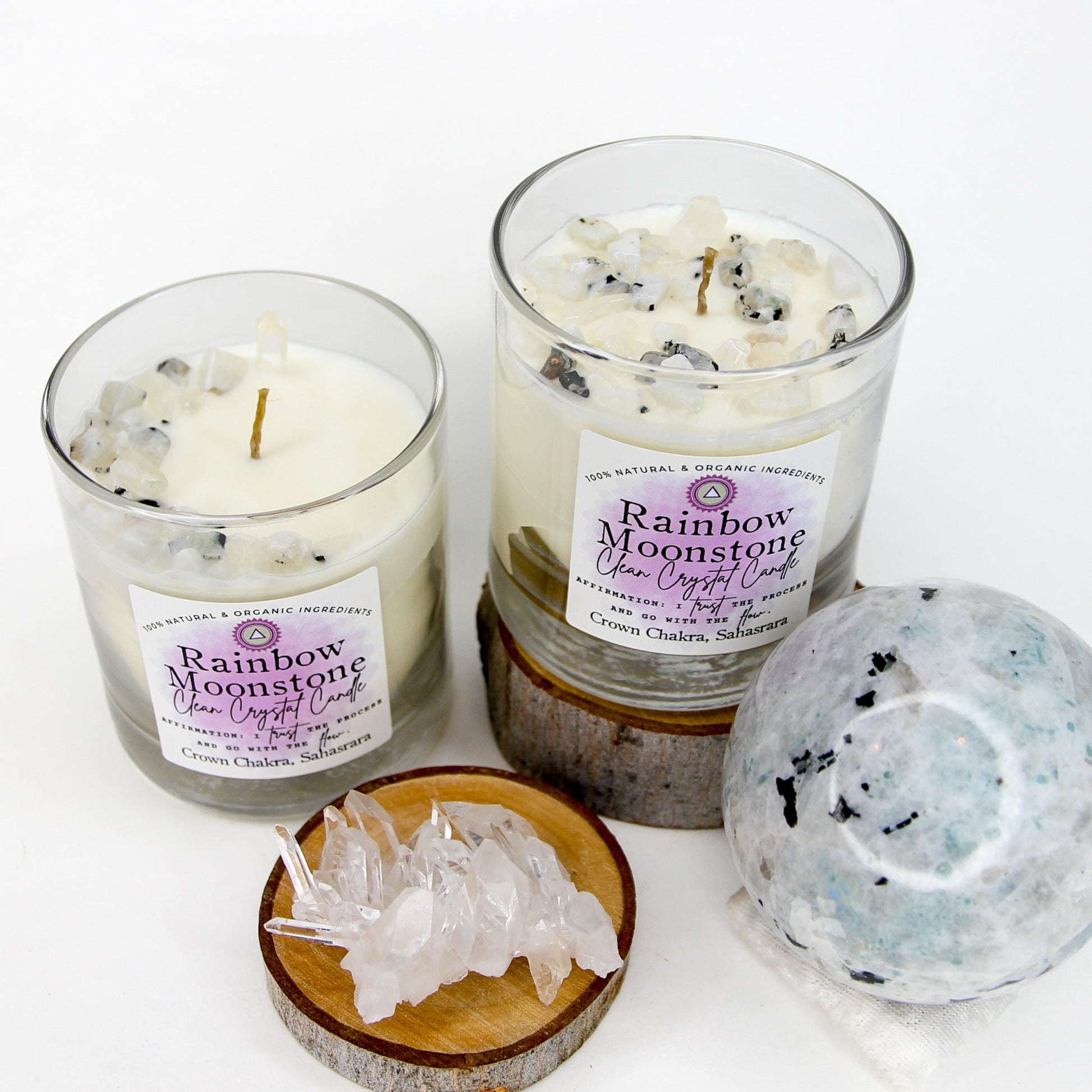Rainbow Moonstone Clean Crystal Candle in a clear lead-free glass tumbler, topped with rainbow moonstone chips and a clear quartz point — product photo 6