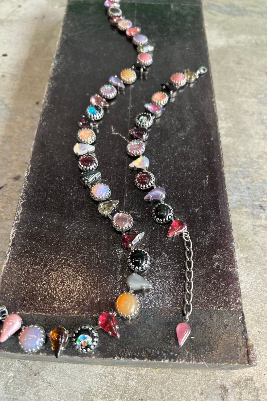 An oxidized silver layering bracelet set with multicolored 1960s dead-stock glass stones — additional product view 3.