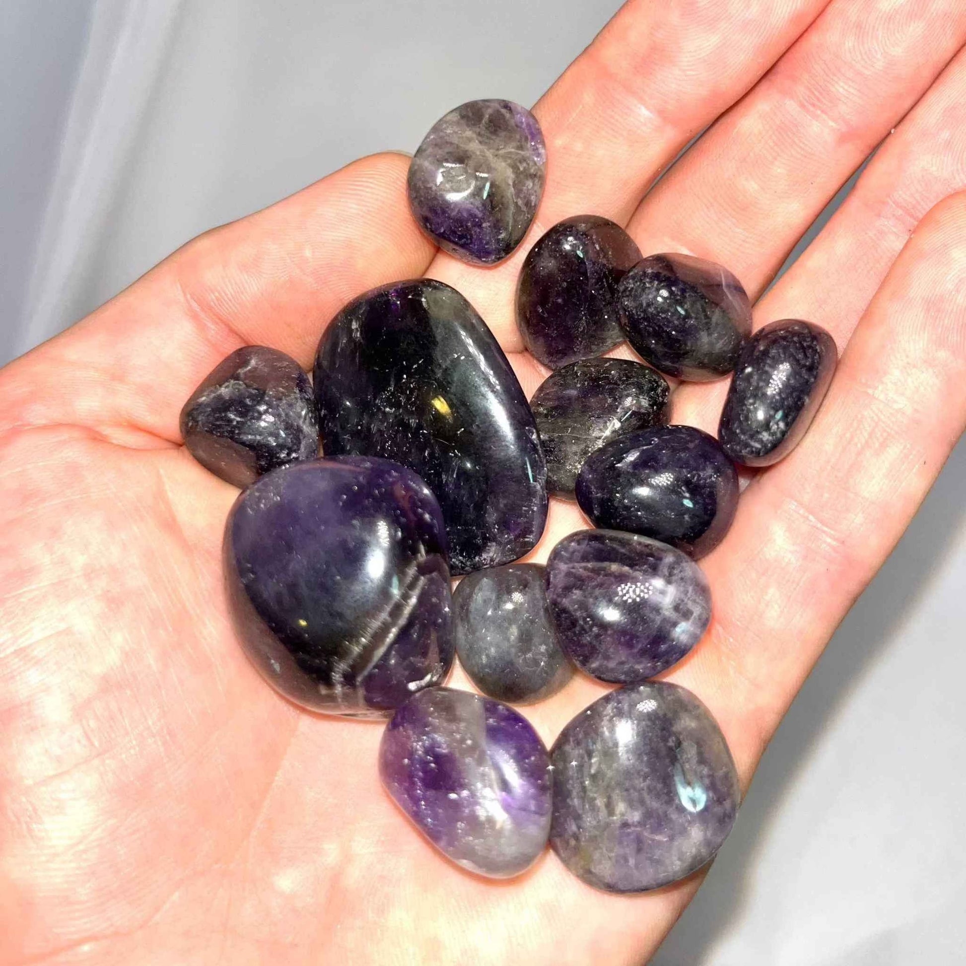 Close view of a polished amethyst pocket stone