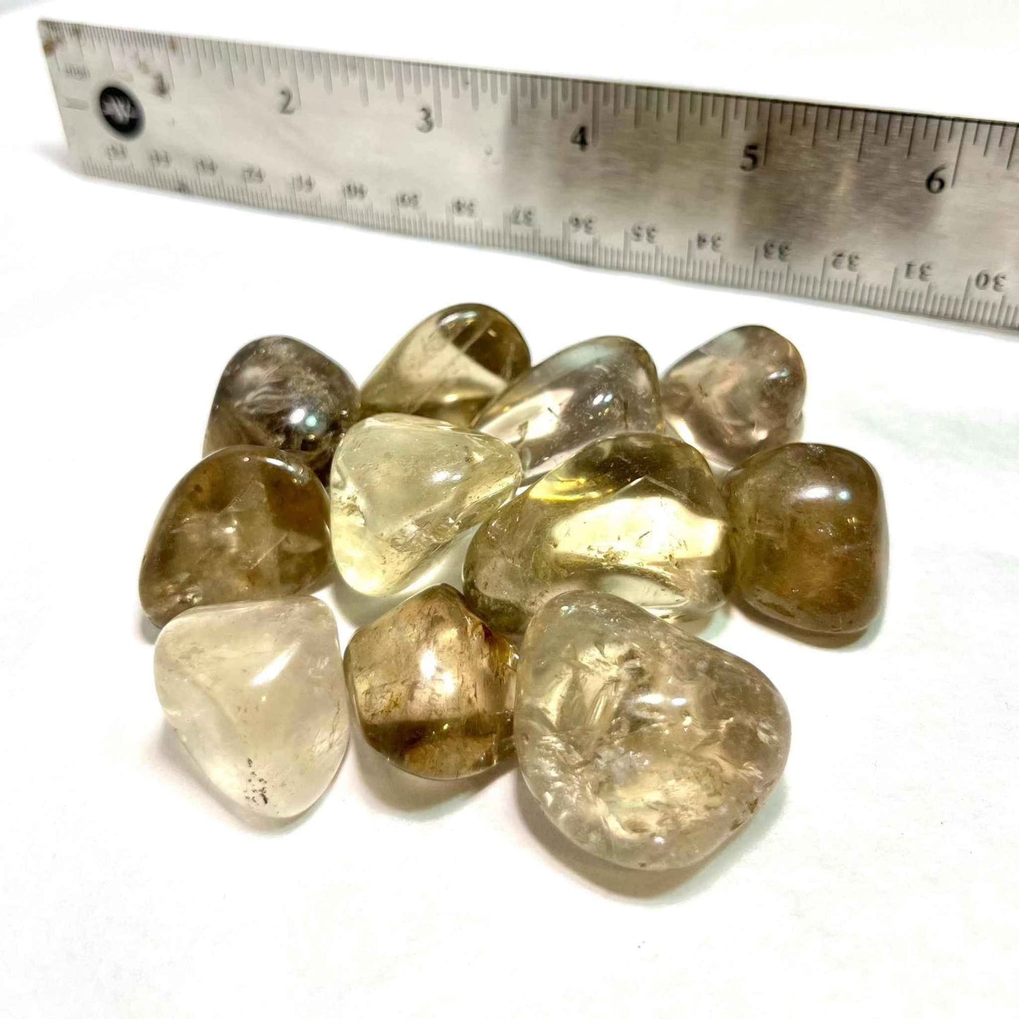 Translucent smoky quartz tumbled pocket stone in soft brown-grey, alternate view