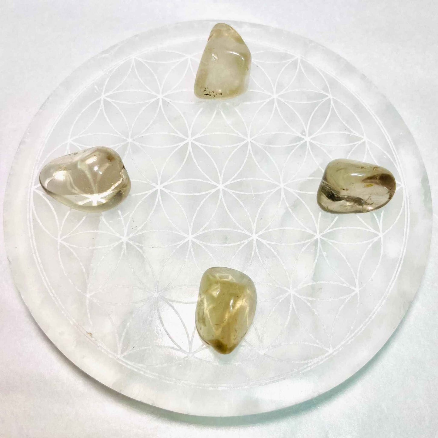 Translucent smoky quartz tumbled pocket stone in soft brown-grey, additional view