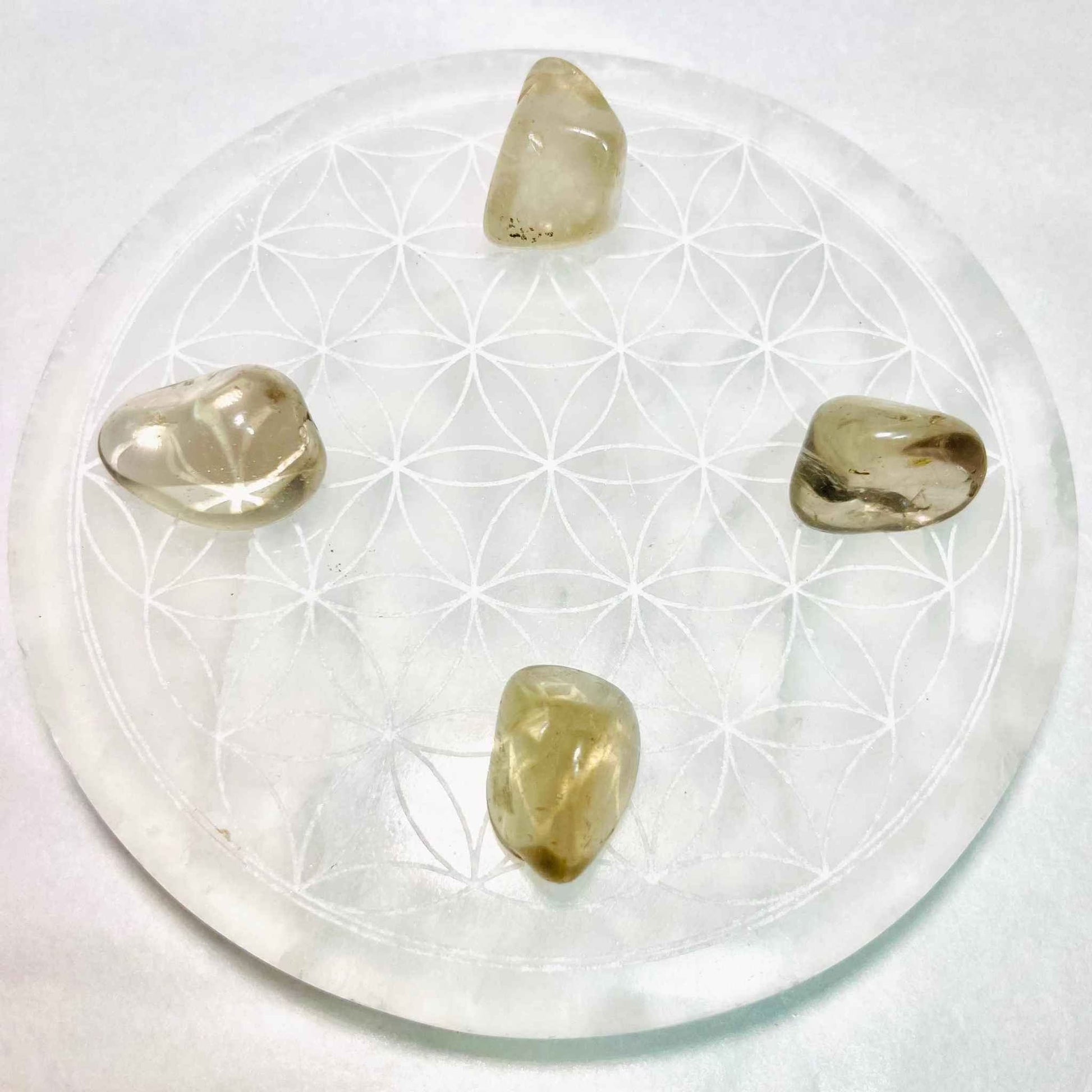 Translucent smoky quartz tumbled pocket stone in soft brown-grey, additional view