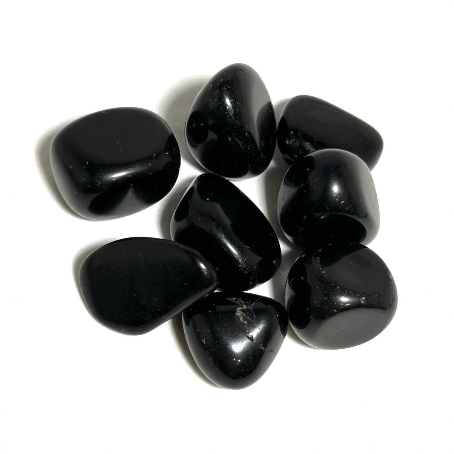 Glossy black tumbled Obsidian pocket stone with a mirror-like surface