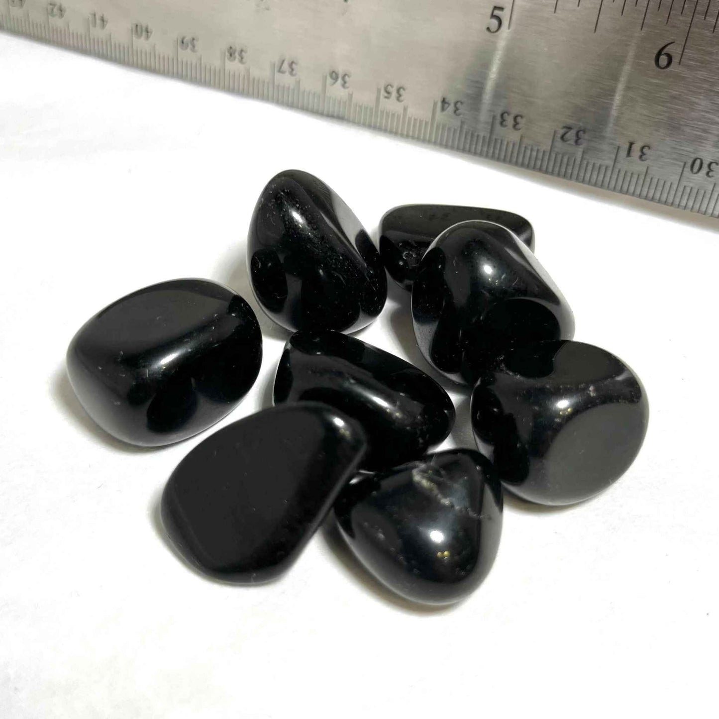Tumbled Black Obsidian stone shown from a second angle
