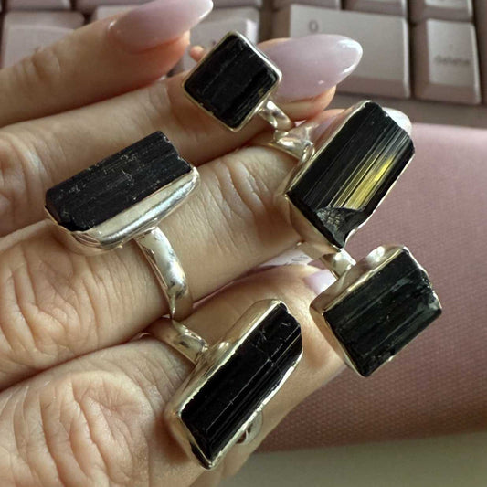 Sterling silver ring set with a rough black tourmaline crystal