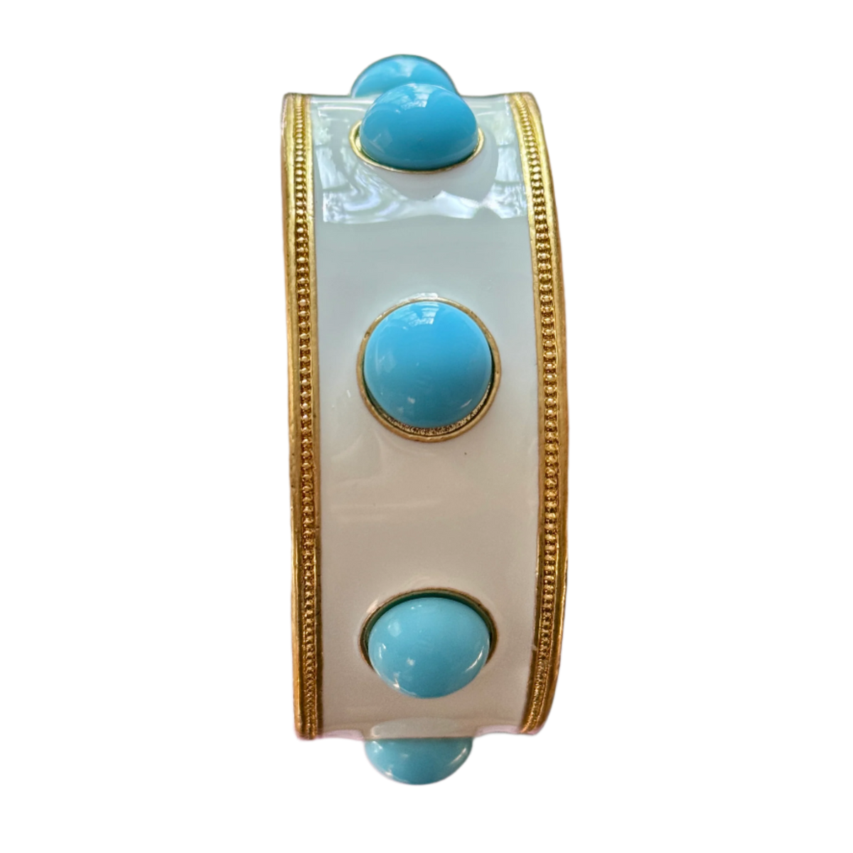 Close-up of the bangle on white, showing the beaded gold edges and the turquoise-blue glass cabochons.
