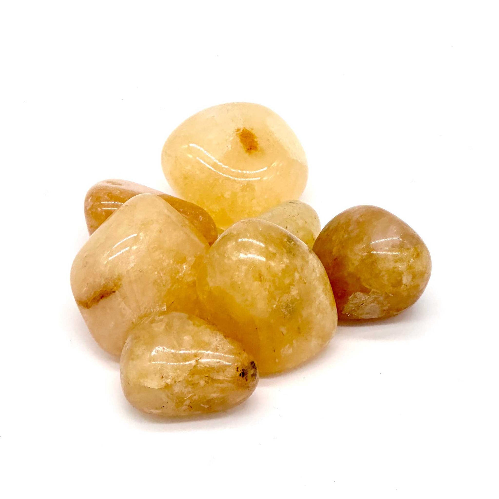 Polished Golden Healer Quartz tumbled stone with warm golden iron-oxide coloring